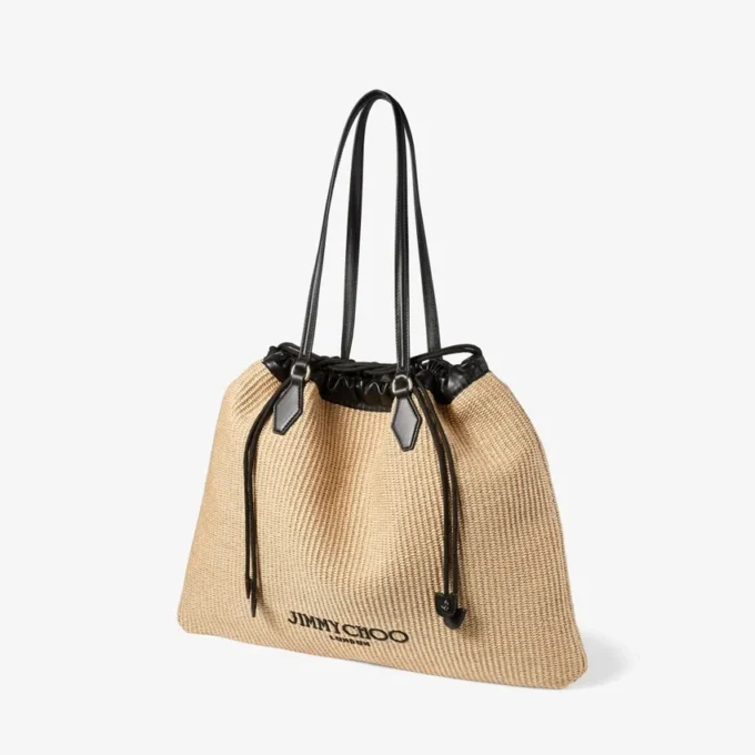 Tote met trekkoord Grote natuurlijke zachte raffia-tote met afwerking van glad kalfsleer Tote met trekkoord Grote natuurlijke zachte raffia-tote met afwerking van glad kalfsleer