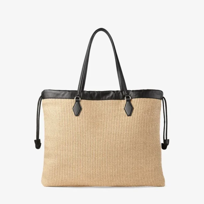 Tote met trekkoord Grote natuurlijke zachte raffia-tote met afwerking van glad kalfsleer Tote met trekkoord Grote natuurlijke zachte raffia-tote met afwerking van glad kalfsleer