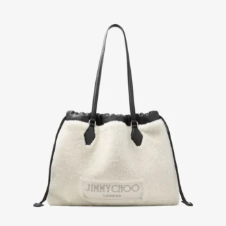 Tote met trekkoord Medium natuurlijke schapenvacht tote met trekkoord en leren afwerking