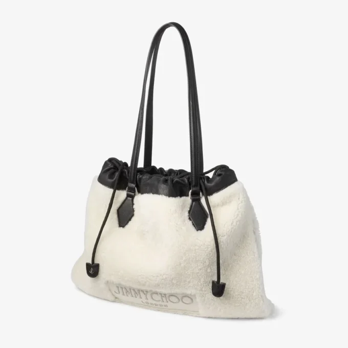 Tote met trekkoord Medium natuurlijke schapenvacht tote met trekkoord en leren afwerking Tote met trekkoord Medium natuurlijke schapenvacht tote met trekkoord en leren afwerking
