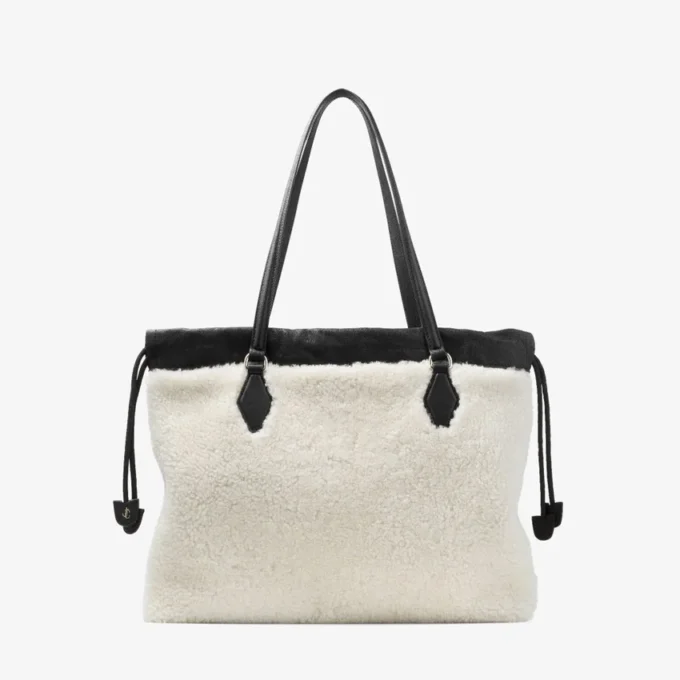 Tote met trekkoord Medium natuurlijke schapenvacht tote met trekkoord en leren afwerking Tote met trekkoord Medium natuurlijke schapenvacht tote met trekkoord en leren afwerking