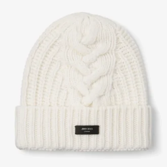 Yuki Cable Latte kabelgebreide beanie met leren logolabel