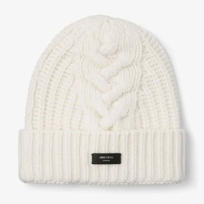 Yuki Cable Latte kabelgebreide beanie met leren logolabel