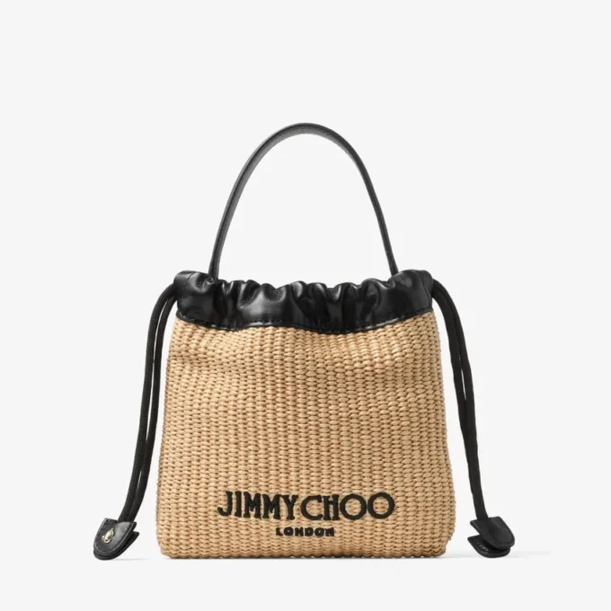 Zakje met trekkoord en handvat Natuurlijk en zwart zacht raffia zakje met trekkoord en leren afwerking Zakje met trekkoord en handvat Natuurlijk en zwart zacht raffia zakje met trekkoord en leren afwerking